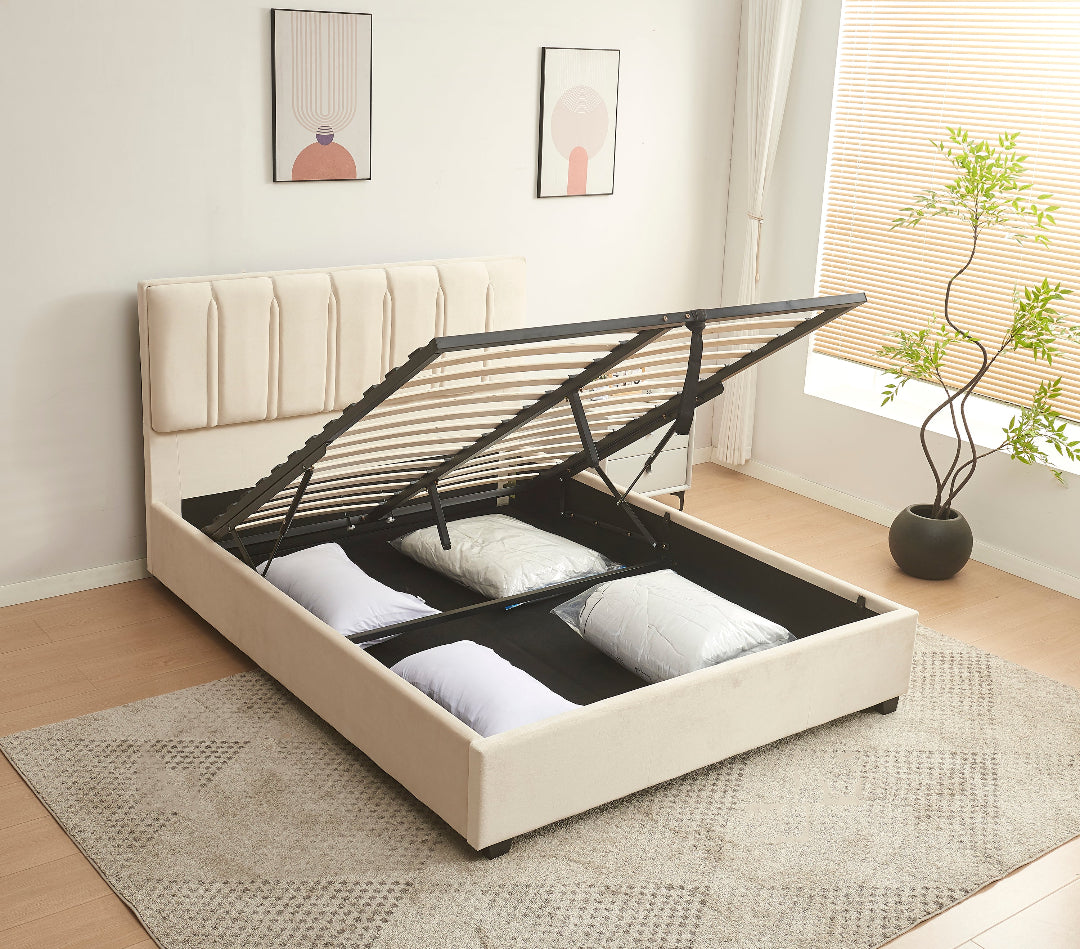 Beige bed frame with storage compartments in a room setting.