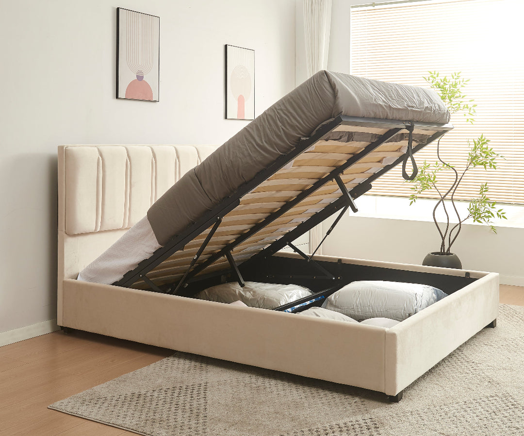 Beige bed with lifting mechanism in a room setting